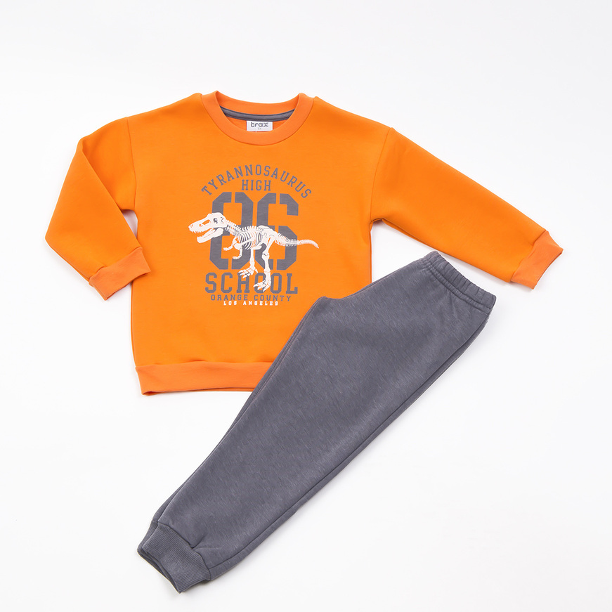 TRAX jumpsuit set in orange color with dinosaur print.