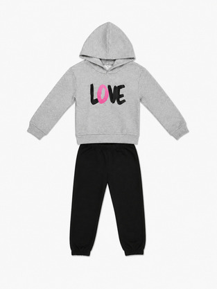 TRΑX tracksuit set in gray and black.