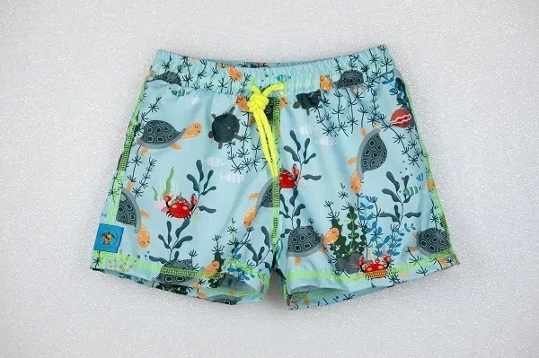 TORTUE bermuda swimsuit with turtle print.
