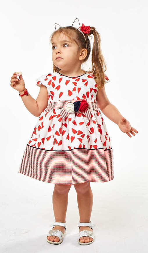 EBITA dress in white color with all over heart print.