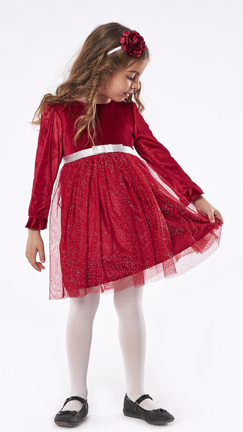 EBITA velvet dress in red with matching trim.