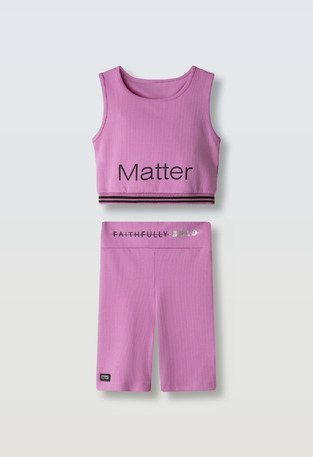 EVITA cycling tights set in fuchsia color and ripstop fabric.