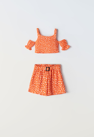 EBITA shorts set in orange color with all over floral design.