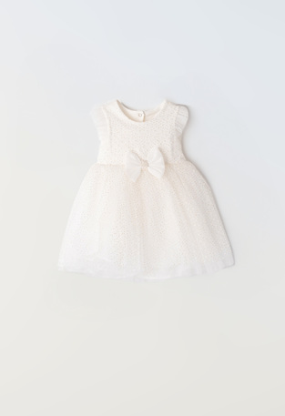 EBITA tulle dress in off-white color with all over polka dots metallic print.