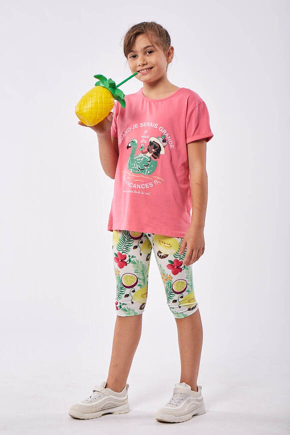 EBITA leggings set, fuchsia blouse and tropical design leggings.