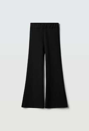 EVITA ribbed leggings in black.