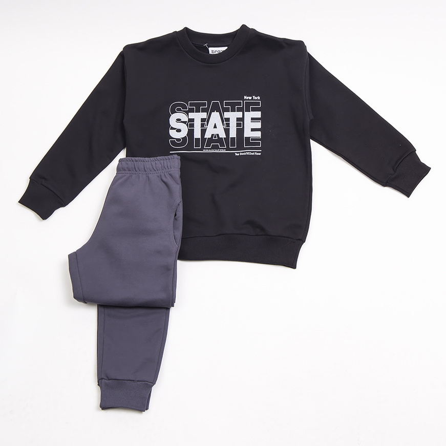 TRAX tracksuit set in black with "STATE" logo.
