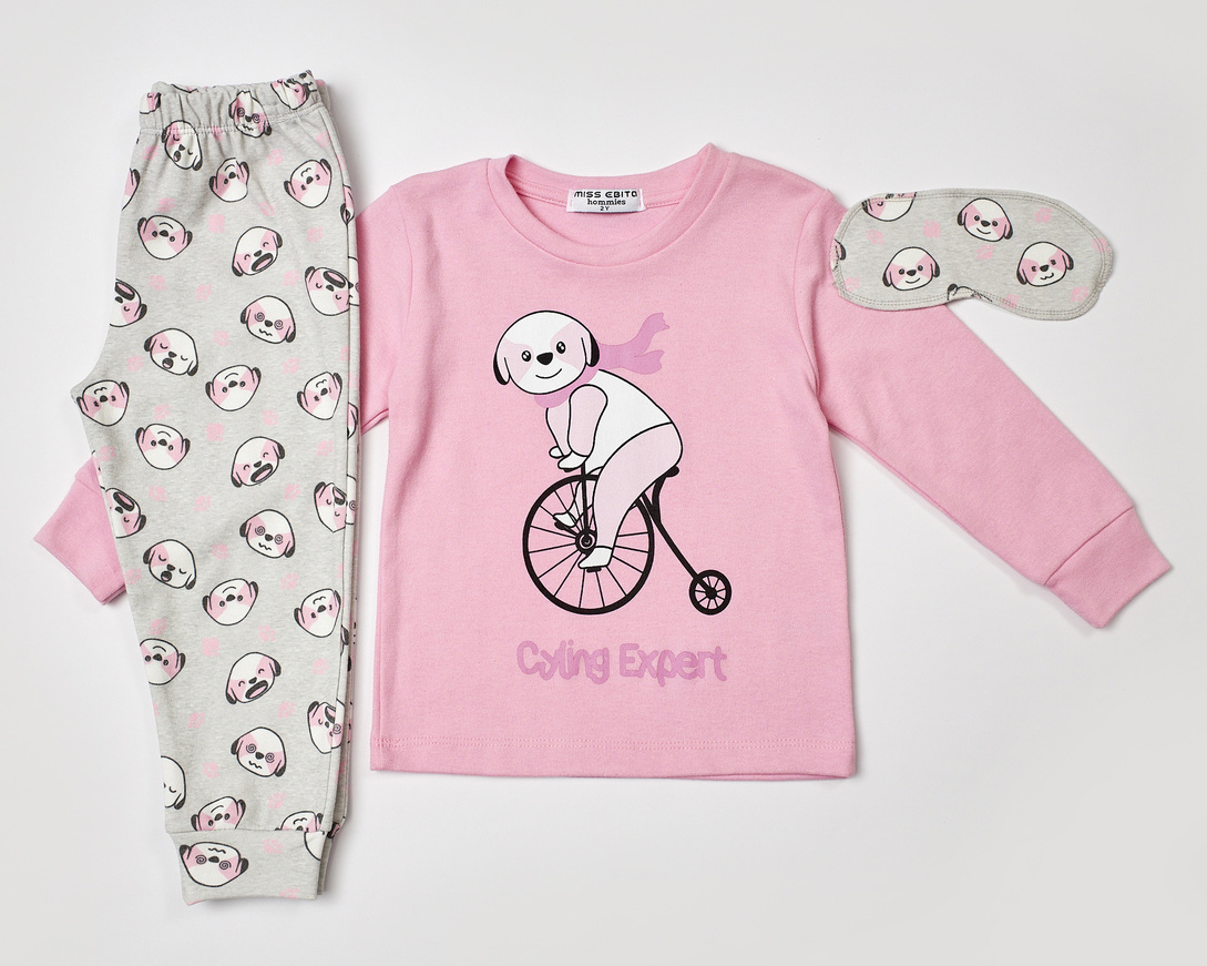 HOMMIES pajamas in pink with dog print and matching sleep mask.