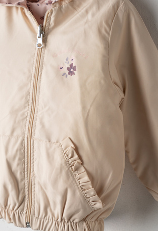 Εποχιακό μπουφάν ΕΒΙΤΑ διπλής όψεως σε μπεζ χρώμα.