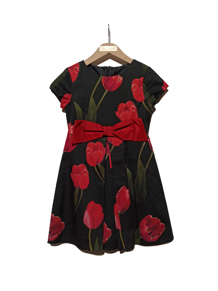Lapin House floral print dress in black with a large red bow detail on the waistband.