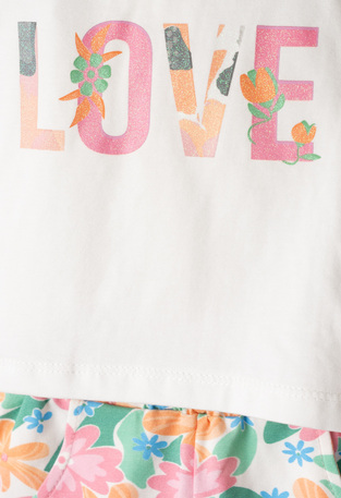 EVITA shorts set in white-printed color with matching ribbon.