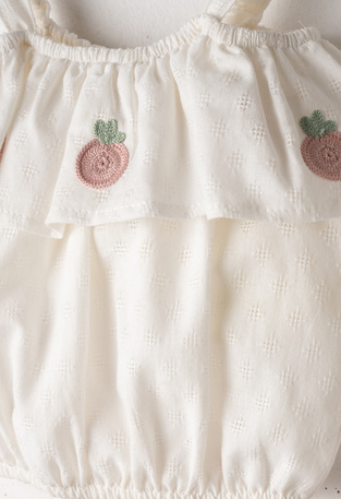 EVITA shorts set in soft ecru with pink.