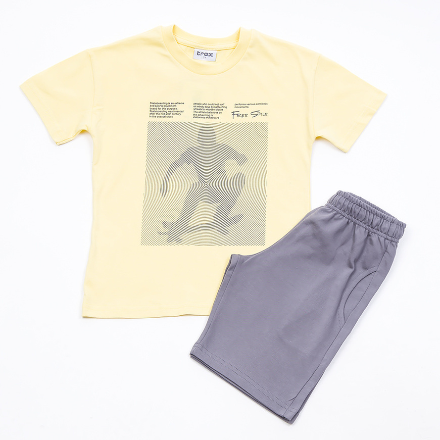 TRAX shorts set in yellow with skater print.