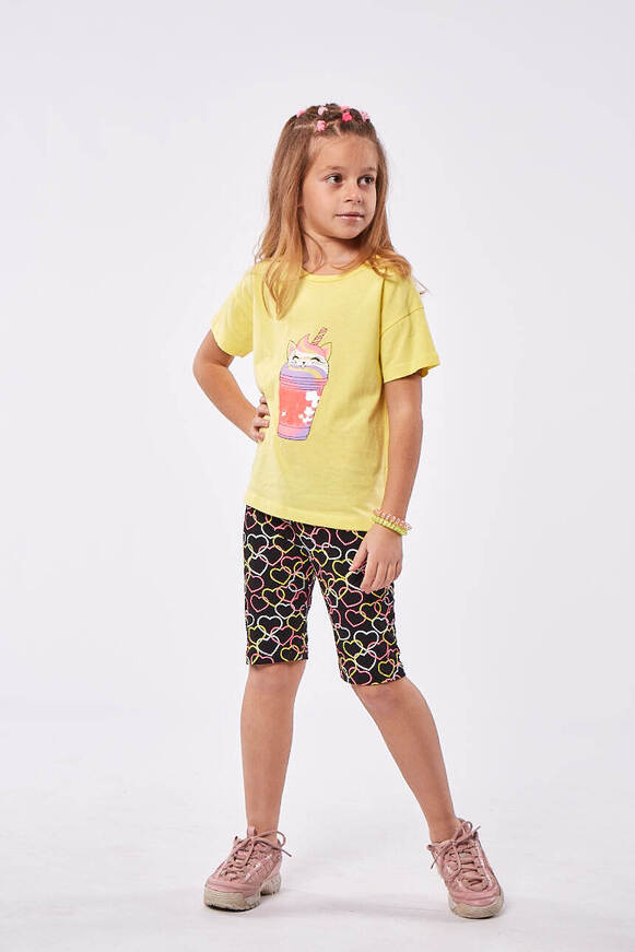 EBITA leggings set, yellow blouse with sequins and cycling leggings.