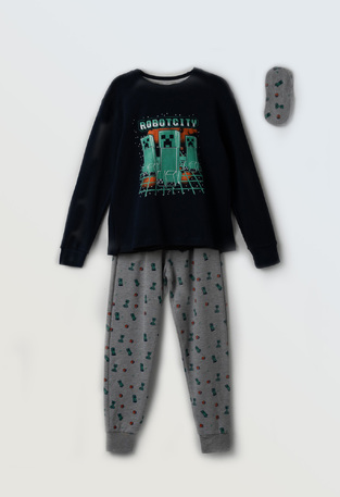 HOMMIES pajamas in blue with an embossed robot print and matching sleep mask.