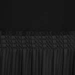 Φόρεμα D.K.N.Y. σε μαύρο χρώμα με δερμάτινο τελείωμα.