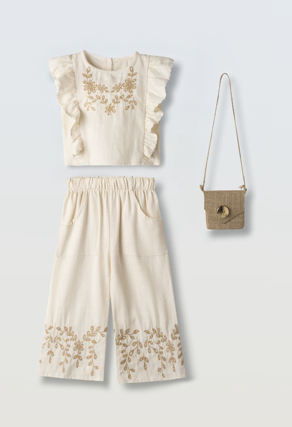 Σετ παντελόνα ΕΒΙΤΑ σε χρώμα μπεζ με ασορτί τσαντάκι.