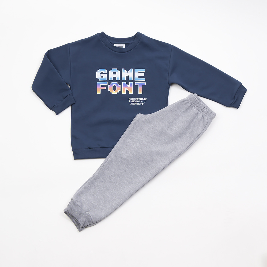 TRAX suit set in blue color with "GAME FONT" print.