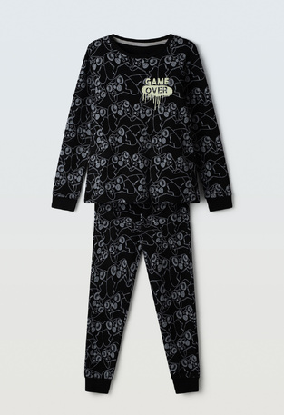 HOMMIES pajamas with matching sleep mask in black.