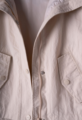 EBITA seasonal jacket in beige color with hood.