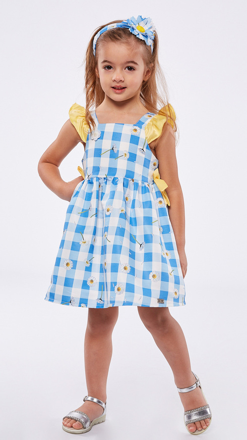 EBITA dress in light blue with straps and matching ribbon.