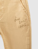 IKKS jeans in yellow color with distinctive print.