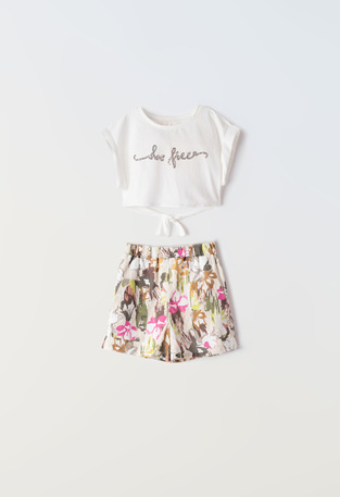 EBITA fabric shorts set with floral design.
