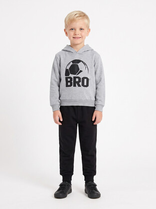 TRAX tracksuit set in gray and black.