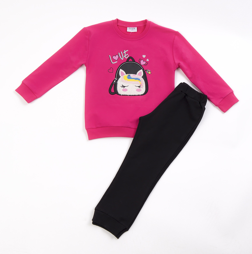 TRAX jumpsuit set, fuchsia sweatshirt with embroidered sequin detail, silver dust and sweatpants with elasticated hem.