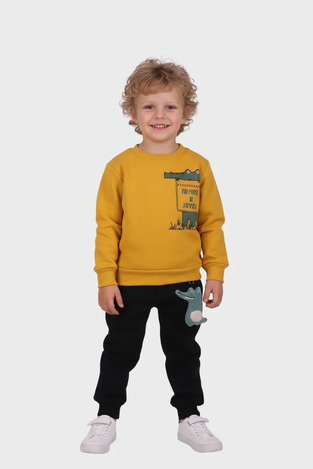 JUCE tracksuit set in mustard and black.