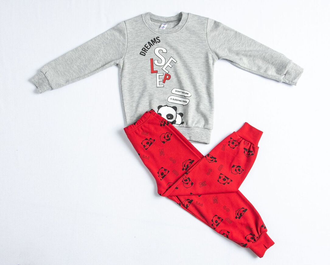 DREAMS pajamas in gray with an embossed sleeping panda print.