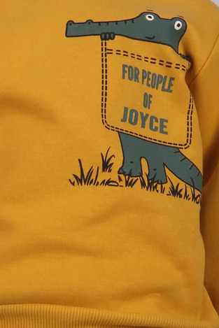 JUCE tracksuit set in mustard and black.
