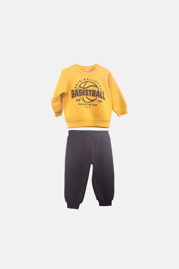 JOYCE tracksuit set in mustard color with "BASKETBALL" logo.