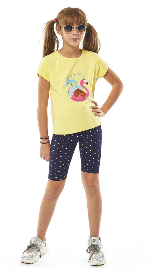 EBITA set of leggings, a blouse in yellow with a print and reversible sequins on the front, and cycling leggings with an all over print of hearts in blue.