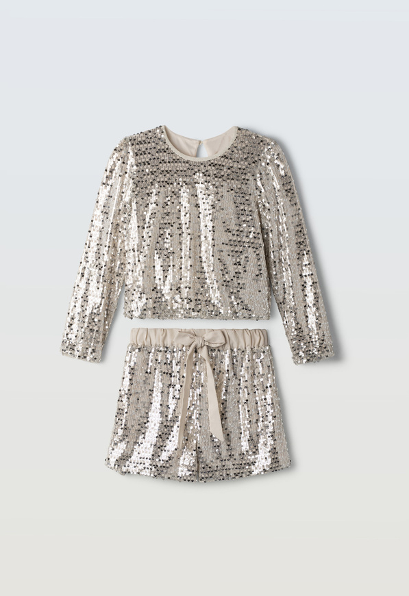 Σετ σορτς ΕΒΙΤΑ σε μπεζ σαμπανιζέ χρώμα με παγιέτες.