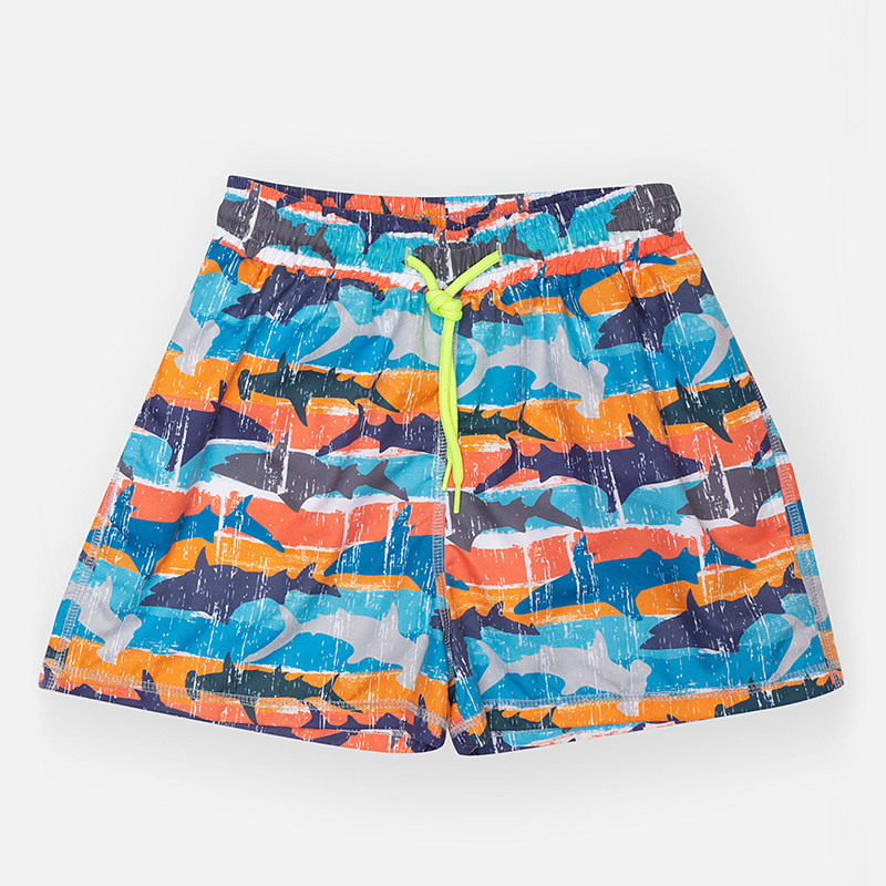 TORTUE bermuda swimsuit with colorful shark print.