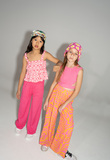 EBITA pants set in orange and fuchsia colors with a printed pattern.