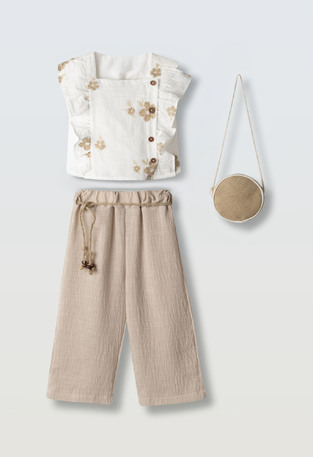 Σετ παντελόνα ΕΒΙΤΑ σε χρώμα εκρού με μπεζ και ασορτί τσαντάκι.