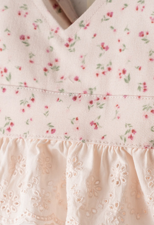 EVITA shorts set in light pink with floral print.