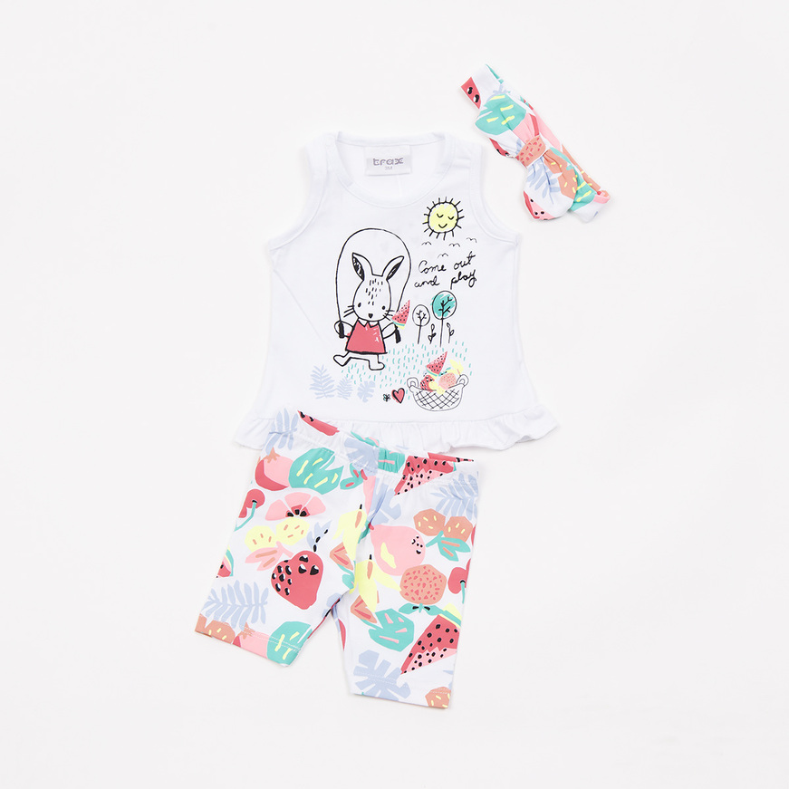 Set of TRAX capri leggings in white color with fruit print and ribbon.