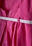 EBITA dress in fuchsia color with pleats.