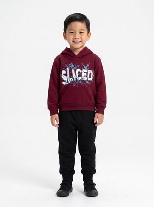 TRAX tracksuit set in burgundy and black.