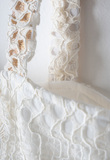 EBITA skirt set in off-white color with lace details.