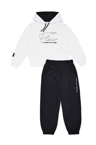 SPRINT jumpsuit set in soft ecru with black.