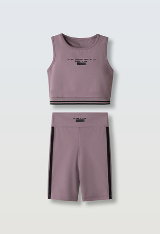 EVITA cycling tights set in purple.