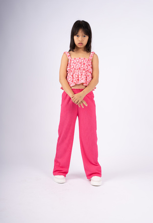 EBITA pants set in fuchsia color with floral design.