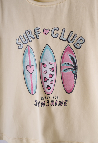 Σετ κολάν κάπρι ΕΒΙΤΑ σε κίτρινο χρώμα με το λογότυπο "SURF CLUB".