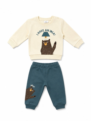 TRAX jumpsuit set in ecru-blue color.