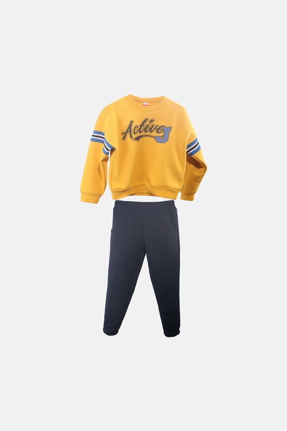 JOYCE tracksuit set in yellow with "ACTIVE" logo.