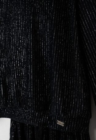 EVITA velvet pants set in black with glitter.